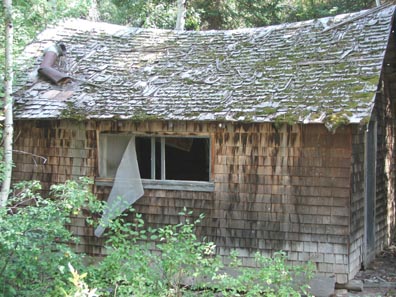 the heavy snow will soon collapse this cabin